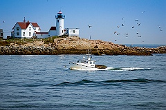 Eastern Point Lighthouse Guides Lobster Boat